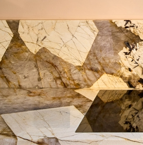 A close-up of a Internal Drawers in walnut finish.