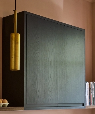 Close-up of a j-groove door in dark finish.