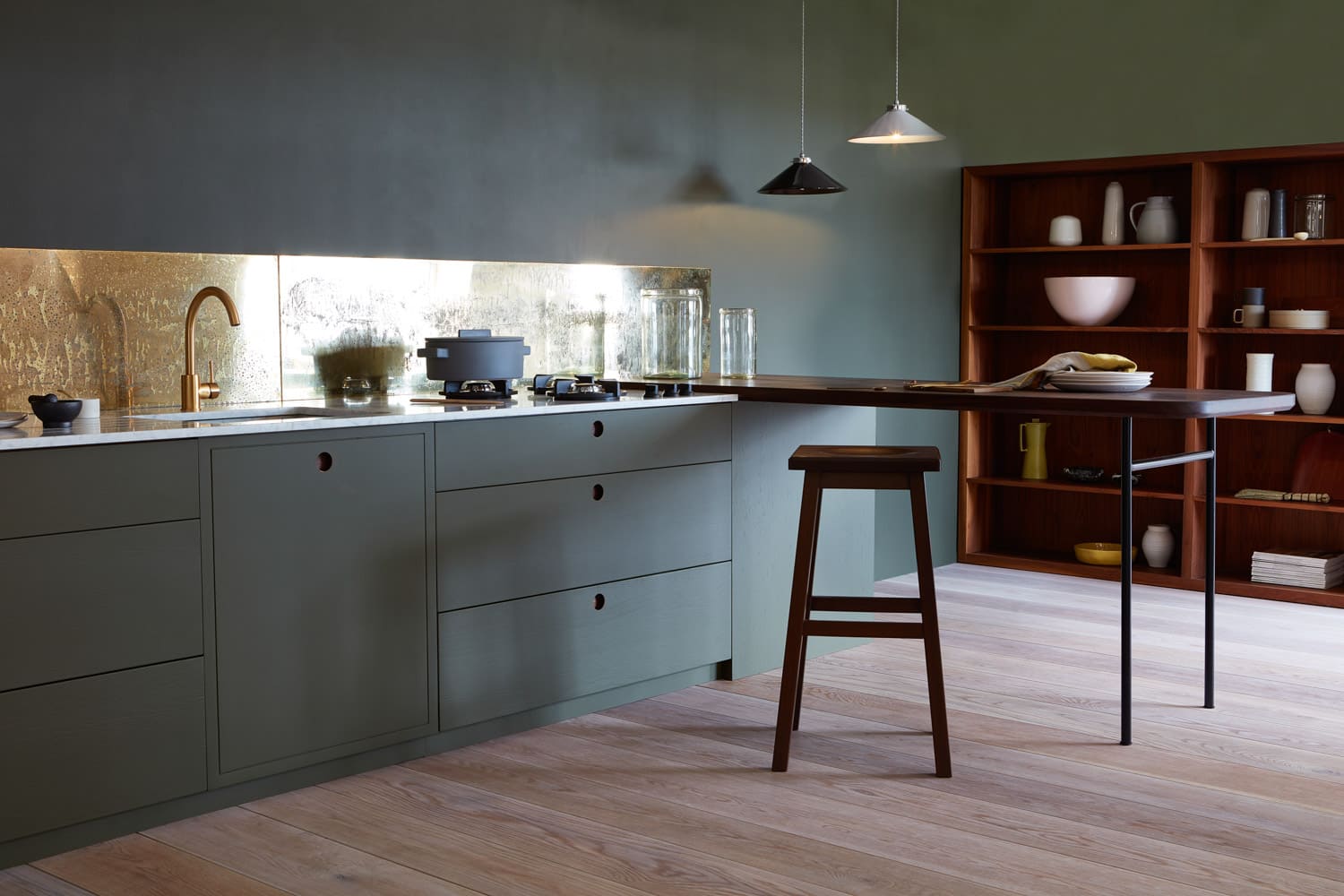 samphire green kitchen with ladbroke handles