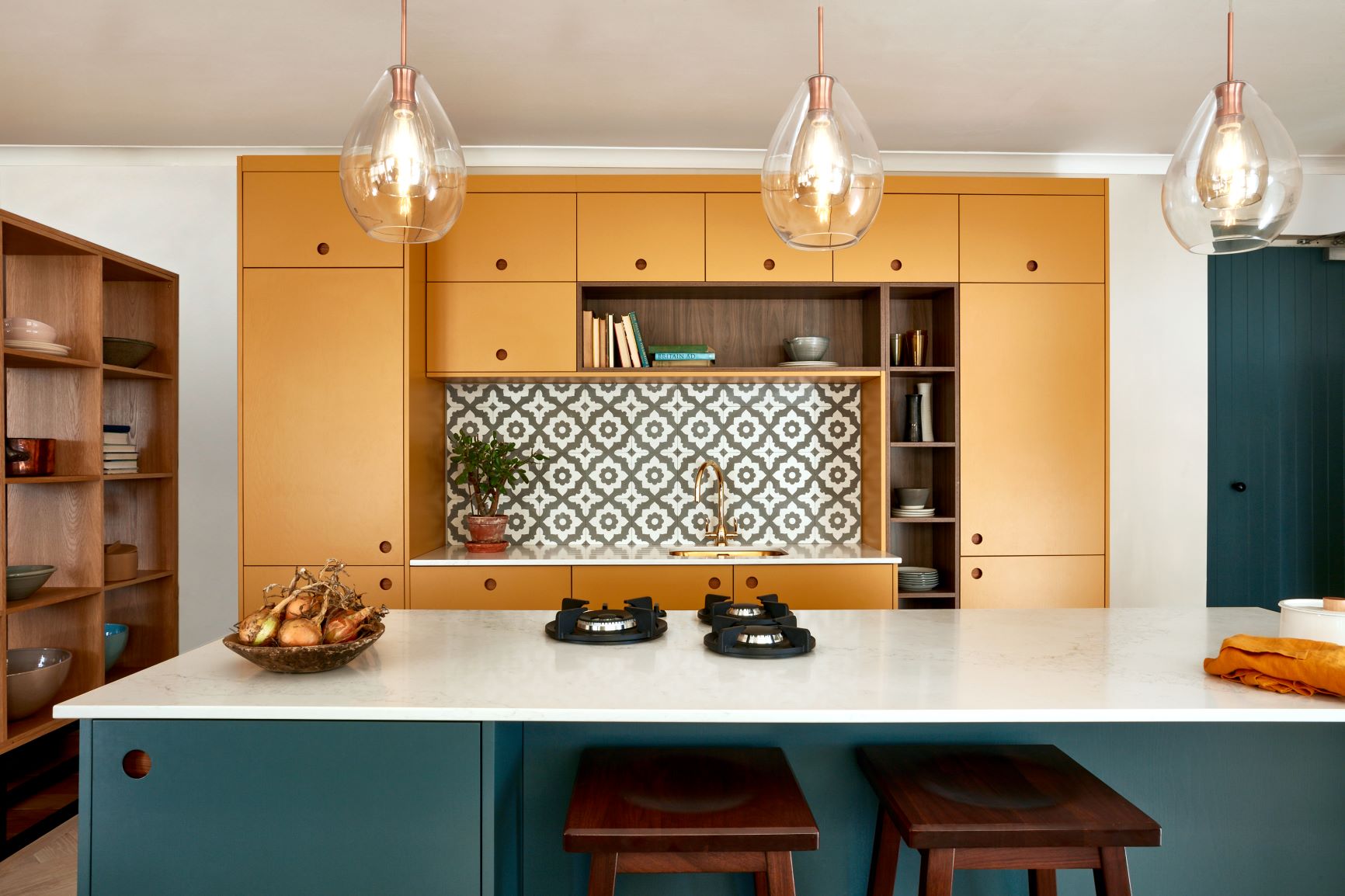 yellow and blue handleless kitchen