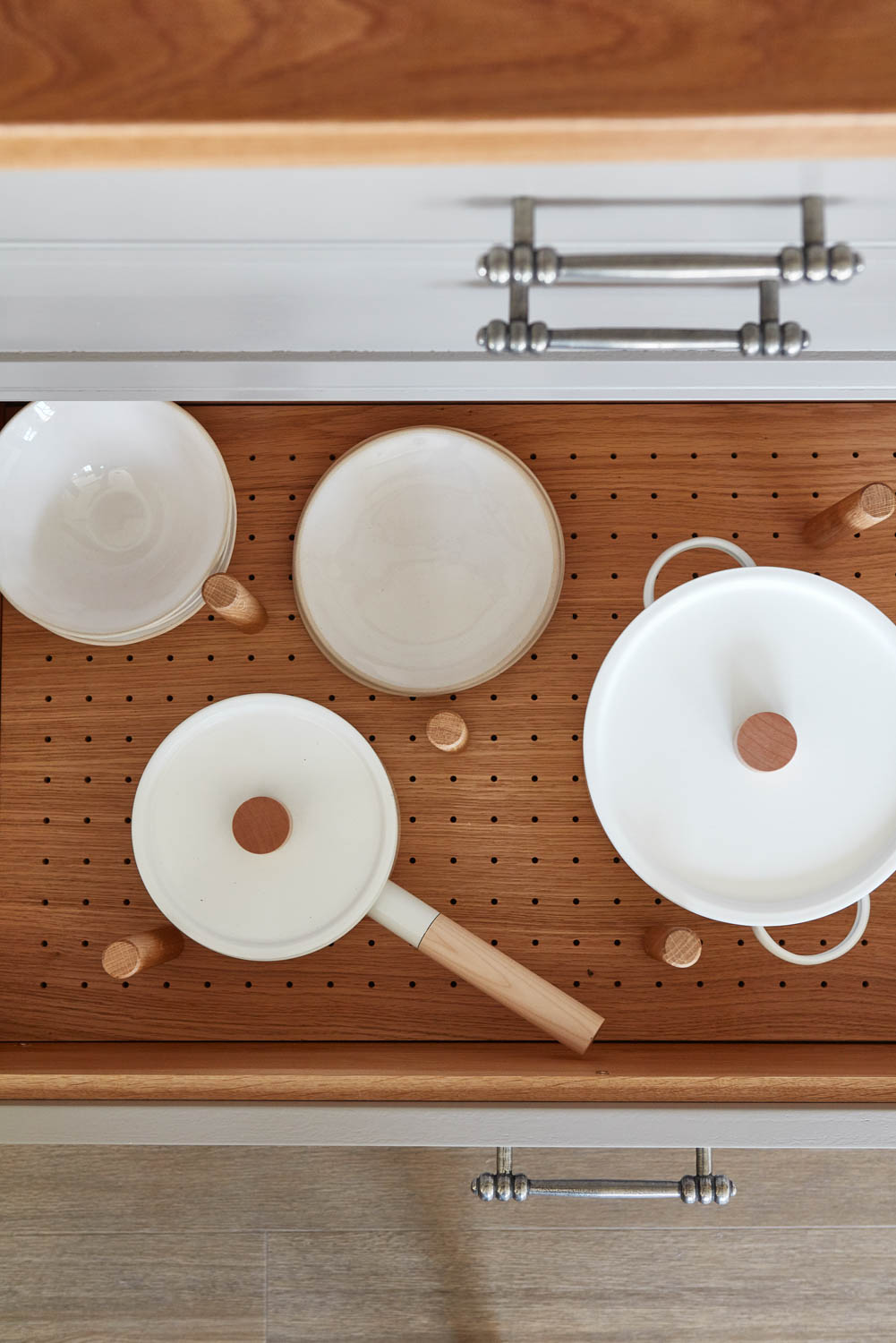 Bespoke in-drawer peg boards for pots and pans