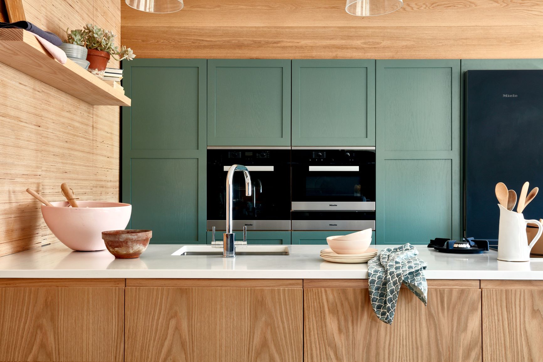 contemporary green frameless shaker kitchen with oak